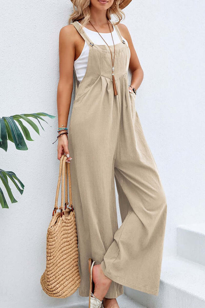 Solid color wide neck jumpsuit for women, comfortable and chic with spaghetti straps.