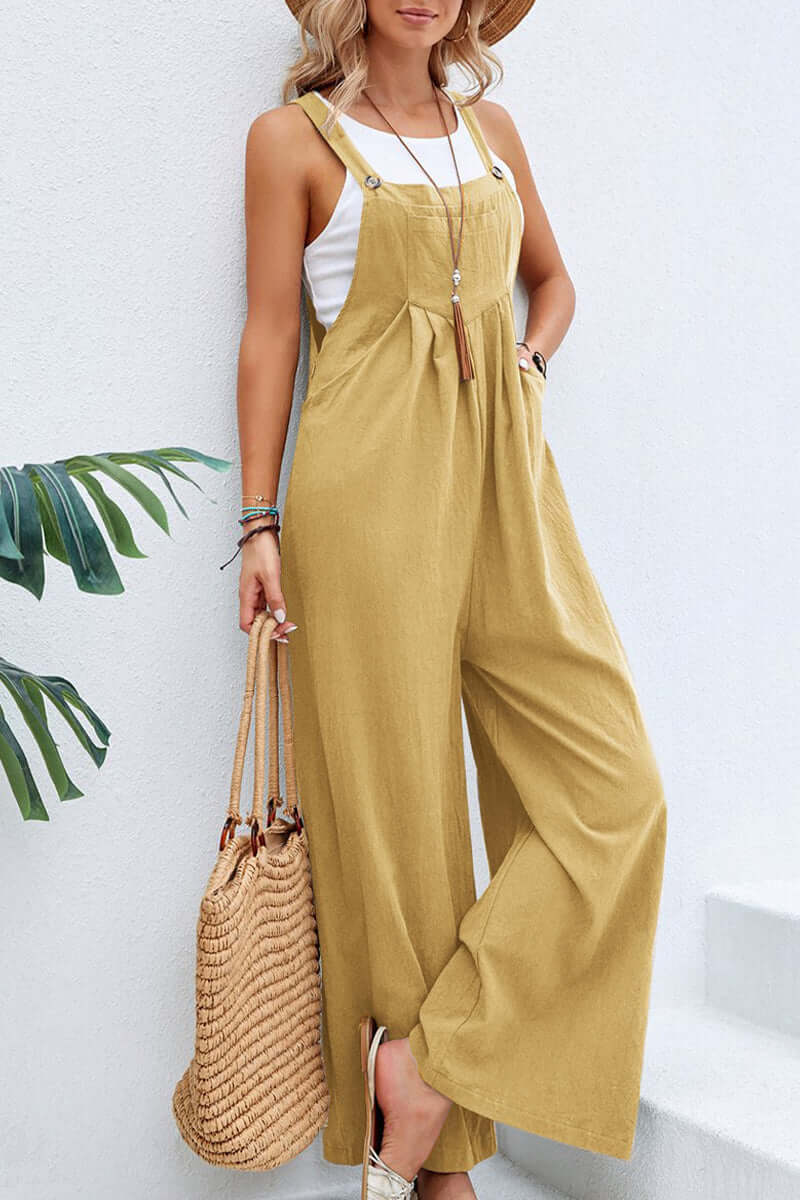 Chic women's wide neck jumpsuit, elegant spaghetti straps, versatile for day or night.