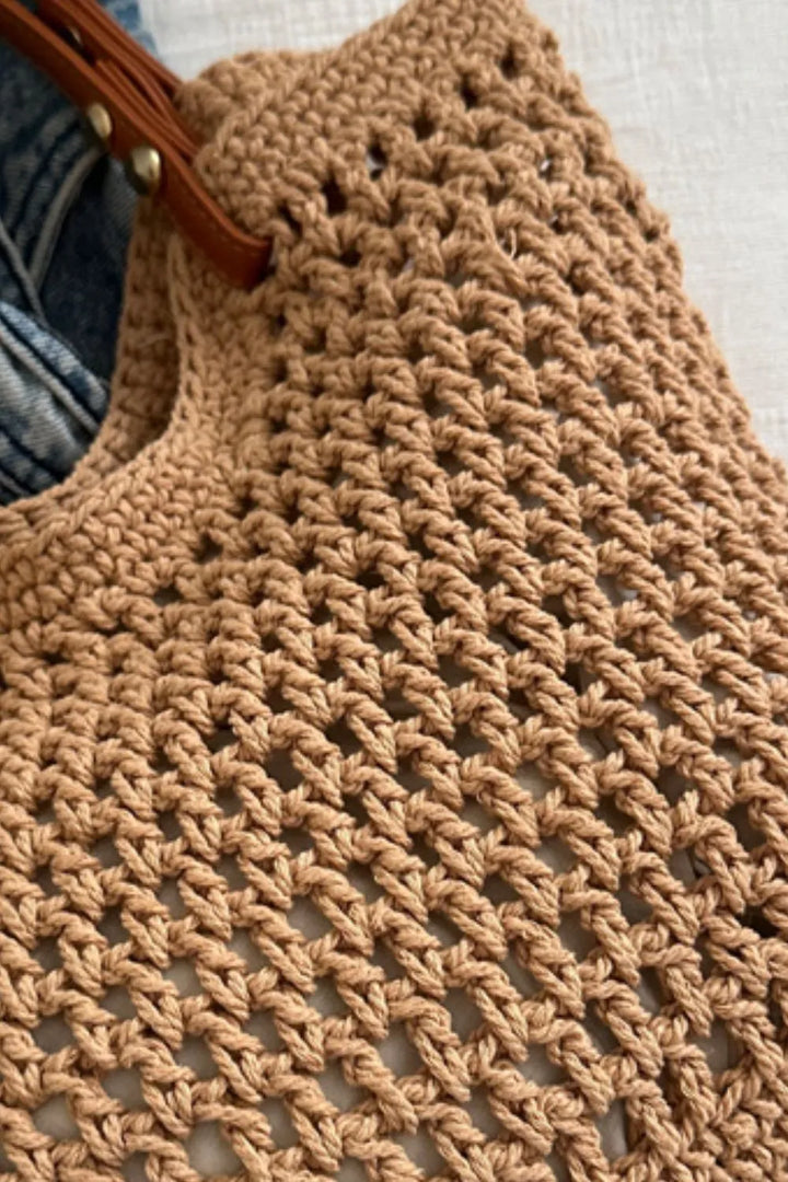 Stylish women's woven cotton shoulder bag, a natural fiber tote perfect for casual outings.