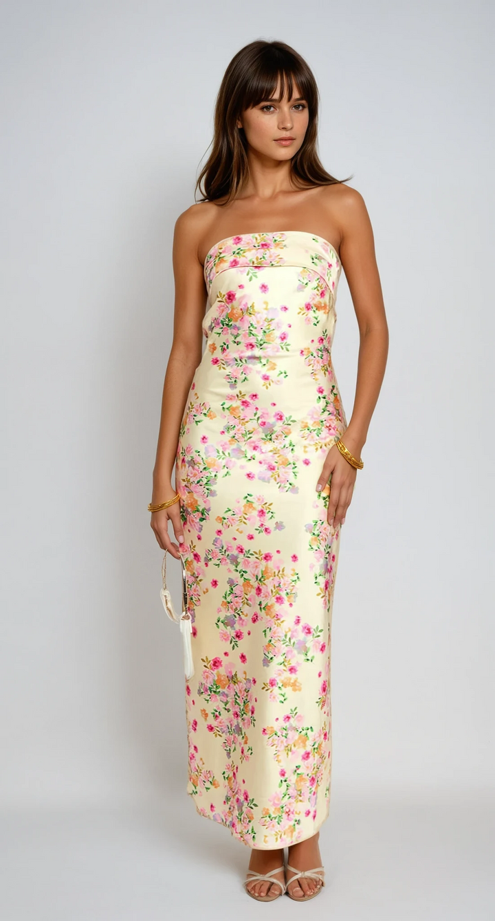Women's yellow floral maxi dress for summer. Perfect vacation outfit & resort wear.