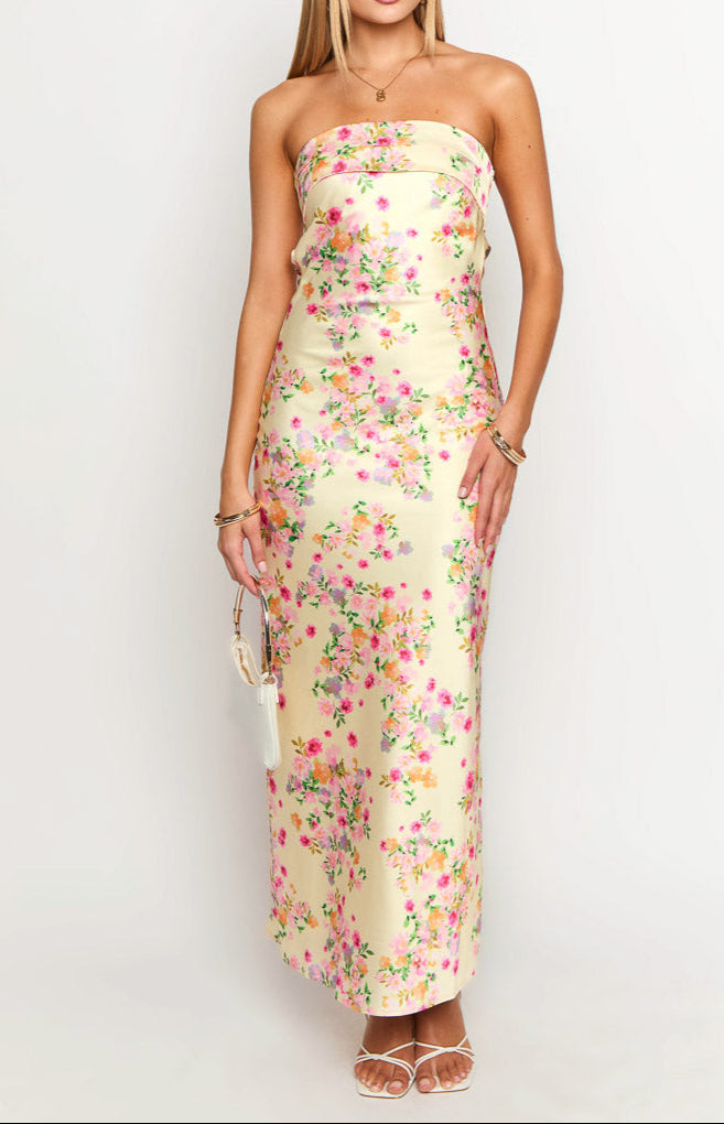 Stylish women's yellow floral maxi dress. Perfect for summer, resort, vacation, or party.