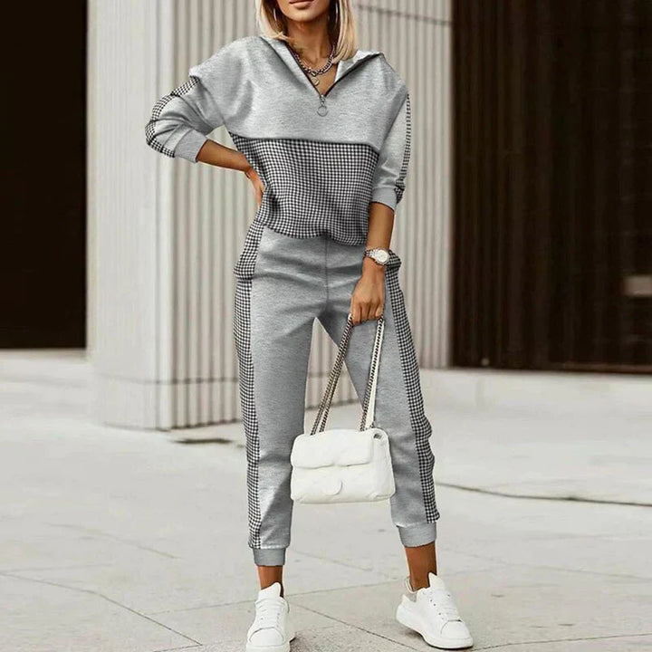 Women's athleisure set with zip hoodie and joggers, featuring a chic patterned design in cosy, breathable fabric.