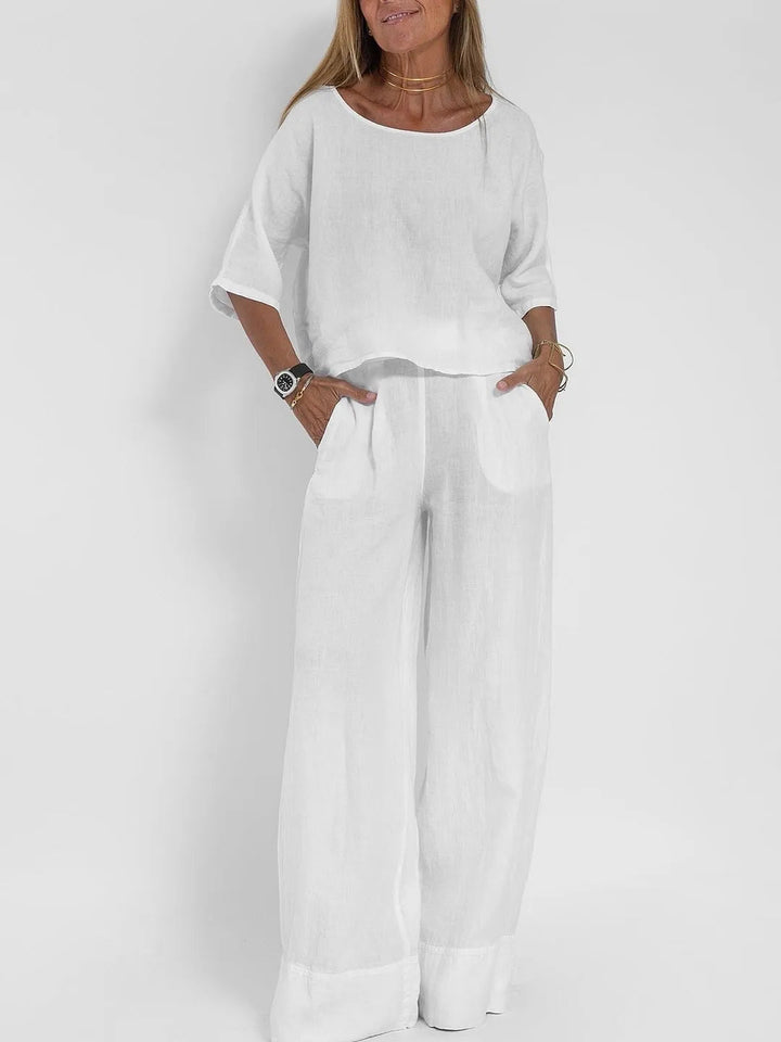 Women's casual outfit set with chic top and matching pants, light formal style, ideal for versatile and stylish wear.