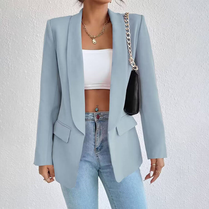 "Women's classic tailored blazer, elegant silhouette, versatile styling for business or casual, timeless appeal, formal look"