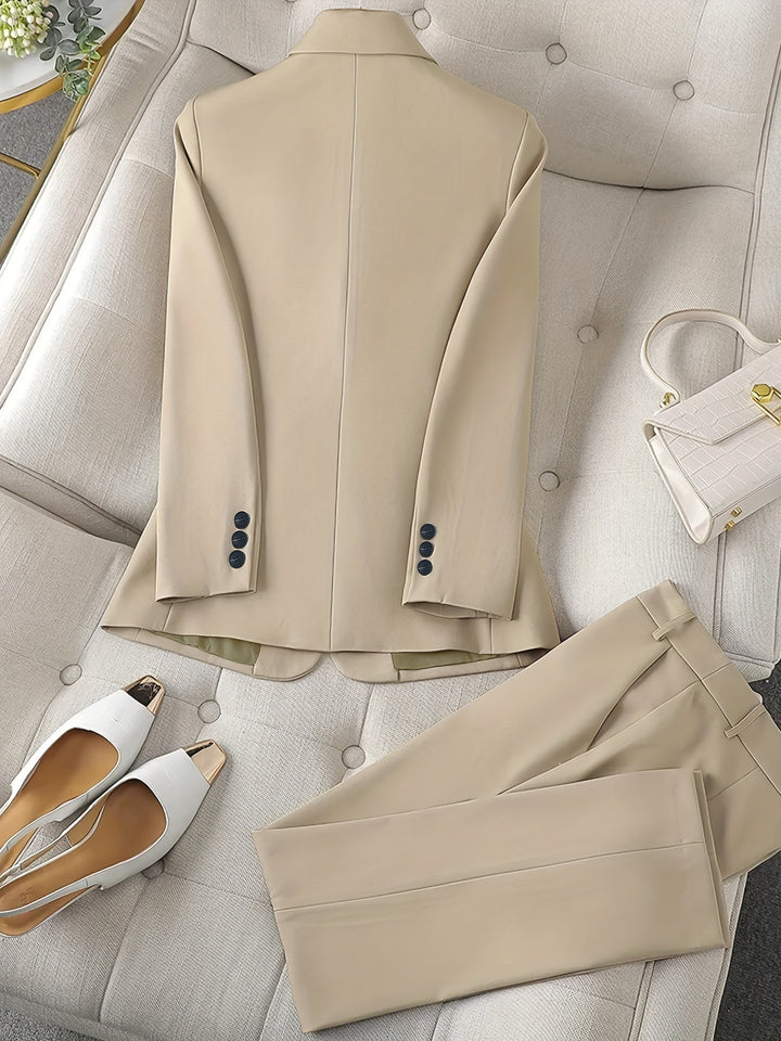 "Women's notched lapel blazer set, tailored fit, long sleeves, versatile all-season elegance, solid pattern in blue."