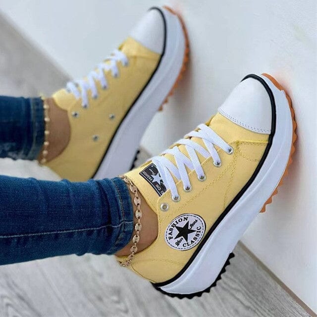 "Women's white chunky sole low-top sneakers, casual style with lace-up closure for modern comfort and versatile wear."