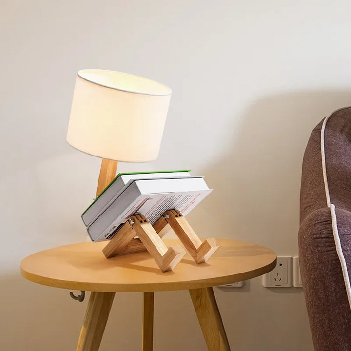 RutanFlex wooden robot lamp, adjustable table lamp, perfect for reading with its book holder feature.