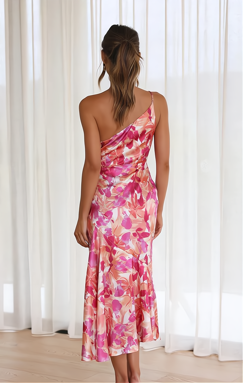 Elegant women's summer midi dress featuring a beautiful floral print and stylish off-shoulder design. Vacation ready.