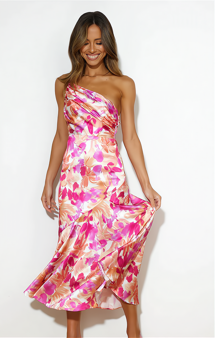 Women's chic floral print off-shoulder summer midi dress. Elegant and trendy for vacation or a stylish party look.